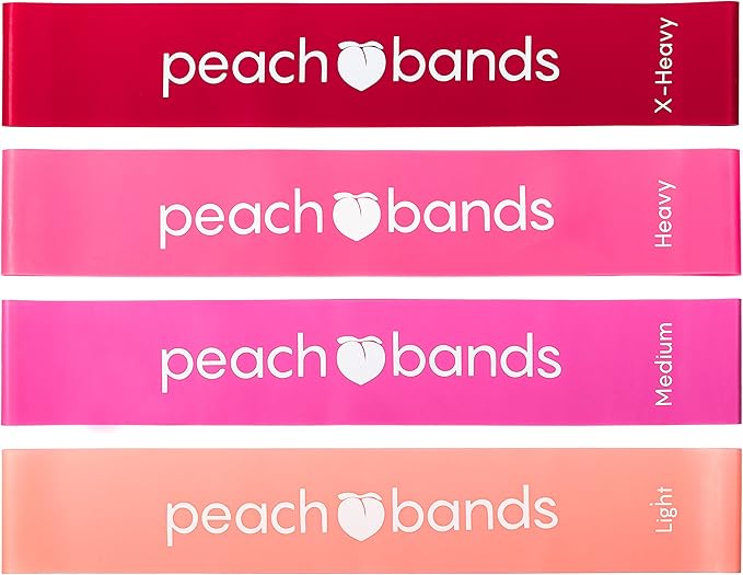 A full set of resistance bands for home workout, including colorful tubes, handles, ankle straps, and a door anchor.